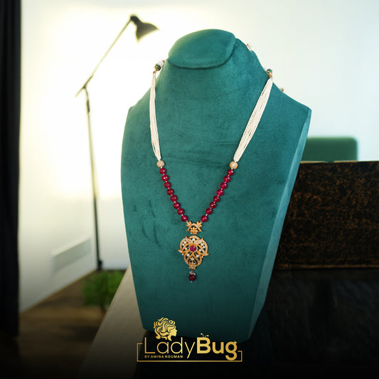 Gold-plated mala, with Ruby stones