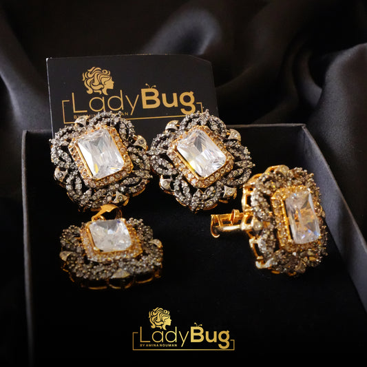 Gold plated diamond cut pendant set with white stones