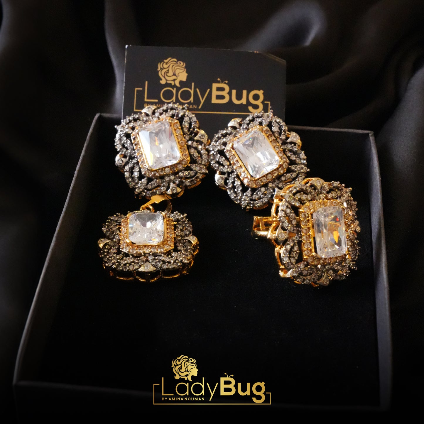 Gold plated diamond cut pendant set with white stones