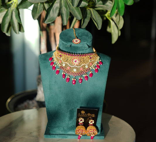 Gold-plated set with Ruby stones and hand paint