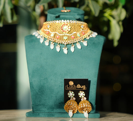 Gold-plated set with white stones and hand-paint